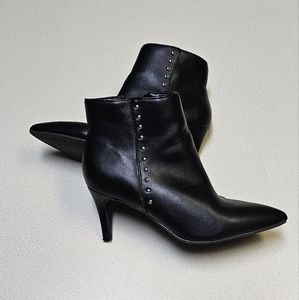 Black ankle women boots size 7.5. Silver design on both sides of each boot.